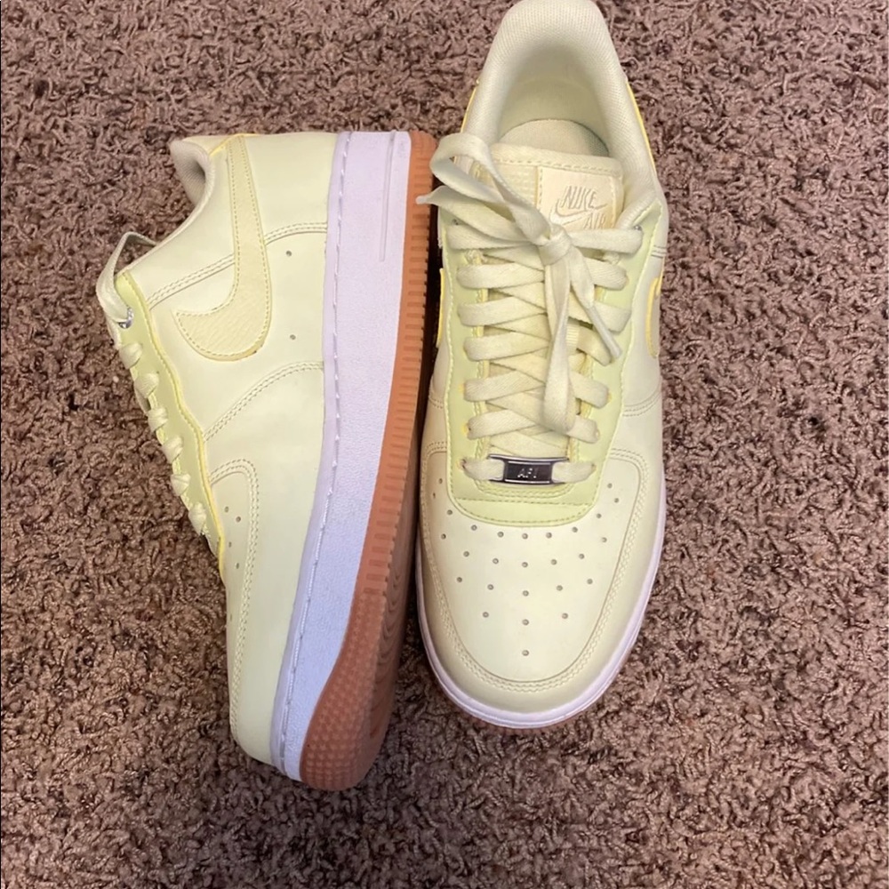 Women’s Nike Air Force 1s in light yellow